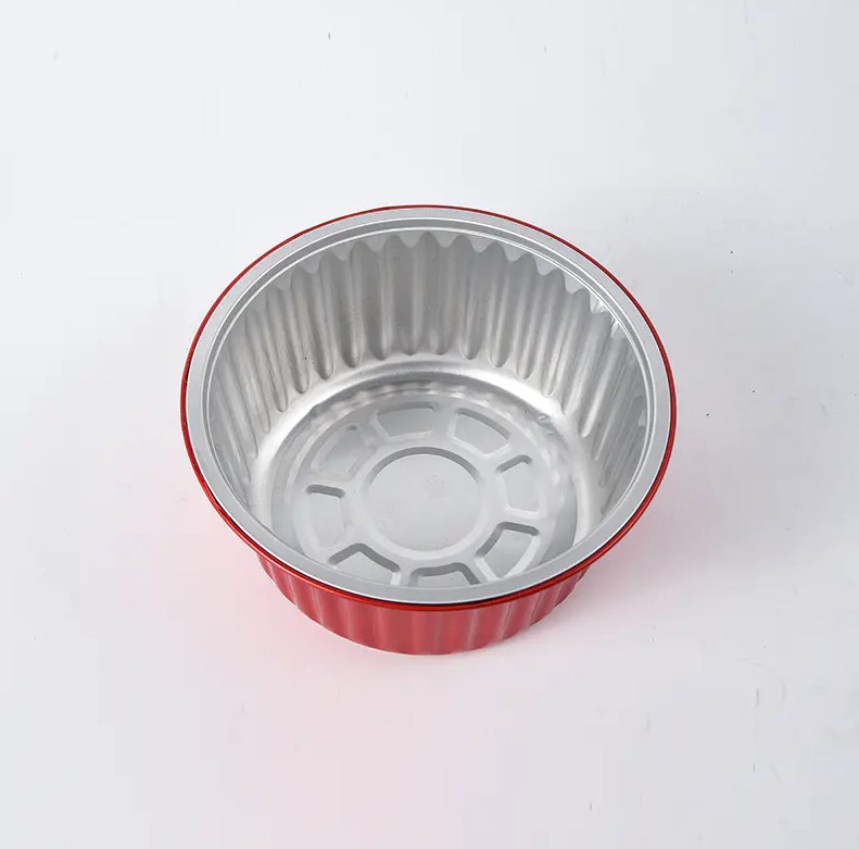 Dalam industri pengemasan makanan, apa keunggulan signifikan Wadah Makanan Aluminium Foil Bulat Bebas Kerut dibandingkan wadah yang terbuat dari bahan lain?